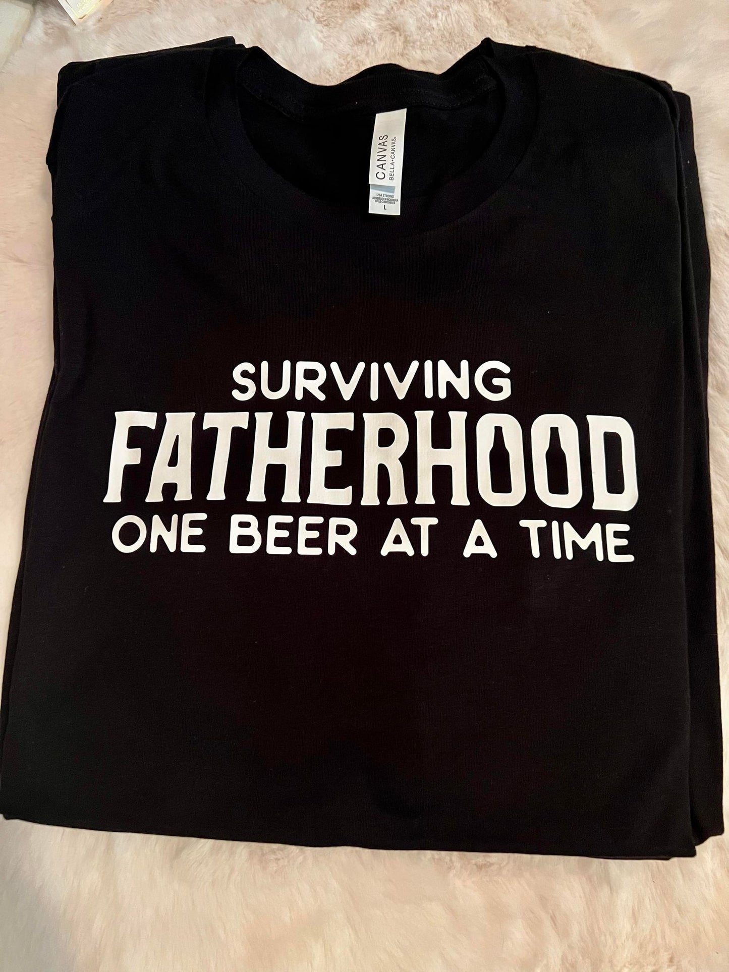Surviving Fatherhood Graphic Tee