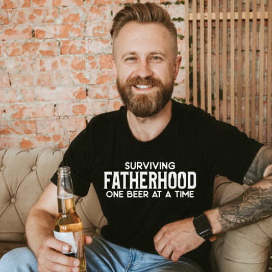 Surviving Fatherhood Graphic Tee